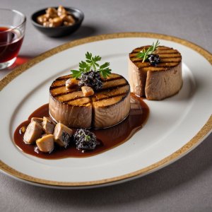 Medallones de pollo con hígado de pato y salsa de boletus