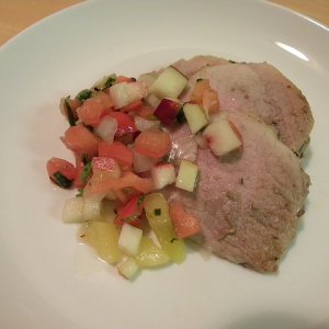 Roast pork with apples and kiwis